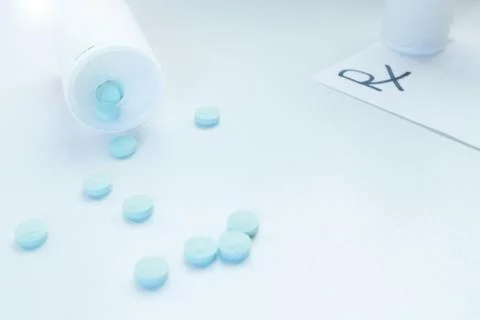Pills capsules spillage Stock Photos
