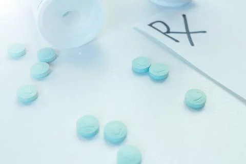 Pills capsules spillage Stock Photos