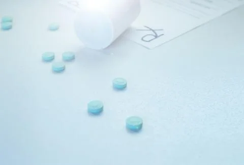 Pills capsules spillage Stock Photos