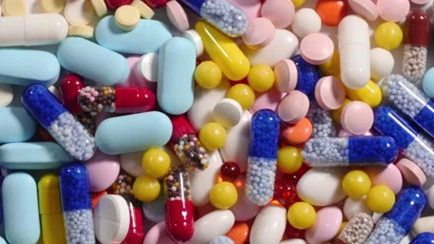 Pills capsules top view Stockbeeldmateriaal 184476679