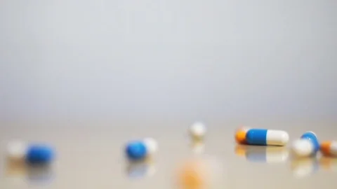 Pills capsules which falling down. Video stock 75400813