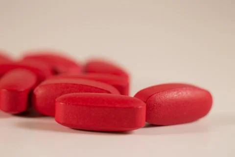 Pills close up red Stock Photos