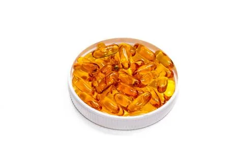 Pills on container Stock Photos