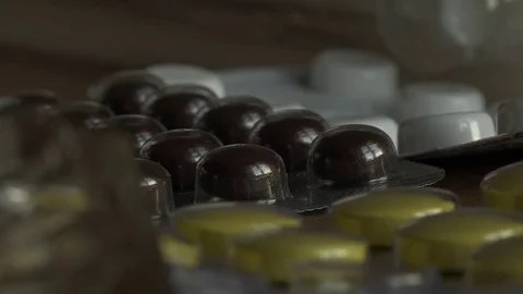 Pills of a different color. Video stock 75195970