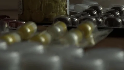 Pills of a different color. Video stock 75207590