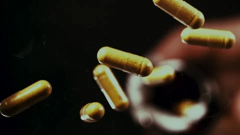 Pills Drop and Bounce Stock Footage 300885393