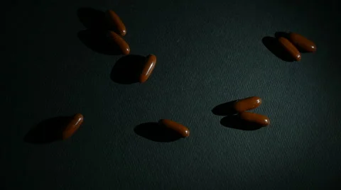 Pills drop dark Stock Footage 62679904