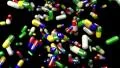 Pills drugs capsules falling slow motion closeup DOF 4K 4k or 4k+ Resolution
