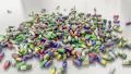 Pills drugs capsules falling on white table counter top slow motion closeup 4K 4k or 4k+ Resolution