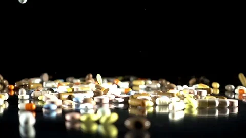 Pills Falling 1 Stock Footage 82961099