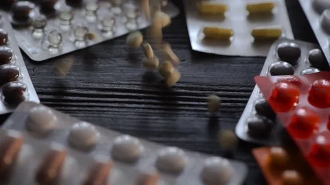 Pills falling and flying towards camera Stock Footage 75656912