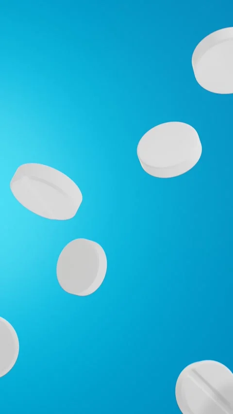 Pills falling on a blue background. 3D looped video 스톡 동영상 265807424