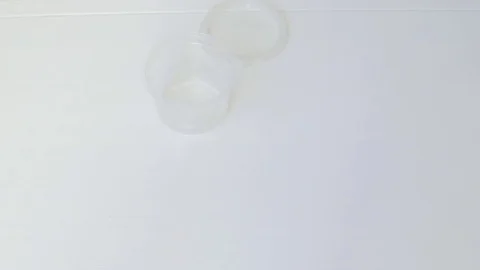 Pills falling into container Video stock 71370454