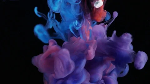 Pills Falling Through Red And Blue Ink 1 Stock Footage 78966159