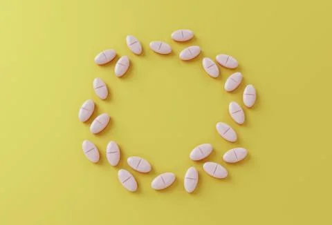 Pills form a circle on yellow table. Medical, pharmacy and healthcare concept Stock Illustration