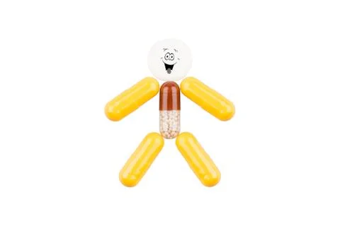 Pills in the form of fun man with an open mouth Stock Photos