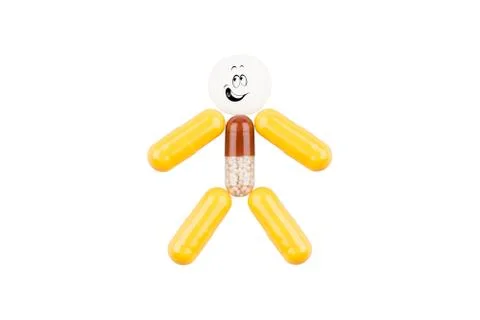 Pills in the form of a fun man Stock Photos