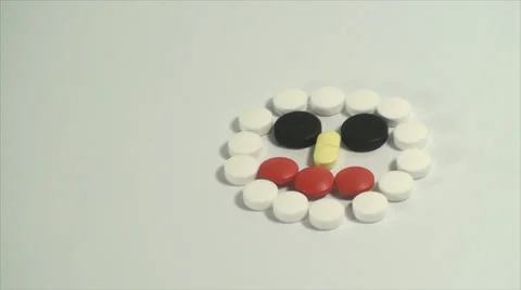 Pills Forming A Face On A White Background, Medical, Medicine, Cure, Treatment Video stock 39351498