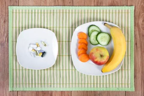 Pills fruit Stock Photos