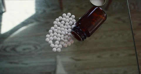 Pills On The Glass Table - Top View And Slow Motion Stock Footage 238327677