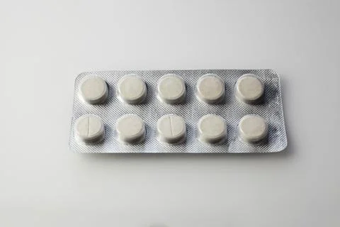 Pills on gray background Foto stock