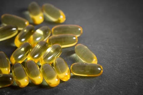 Pills on gray stone table with copy space Stock Photos