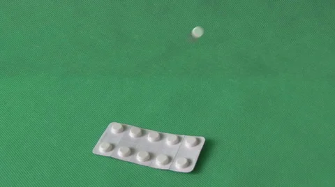 Pills on green background Stock Footage 59117152