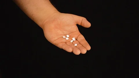Pills In Hand Black Background Stock Footage 119562798