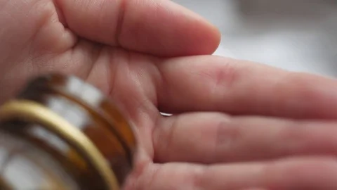 Pills in the hand. Stock Footage 84752402