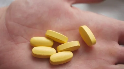 Pills in the hand. Stock Footage 84760455