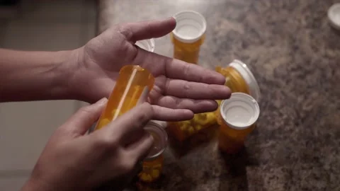 Pills in hand Stock Footage 212099442