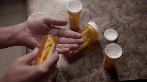 Pills in hand 스톡 동영상 212099443