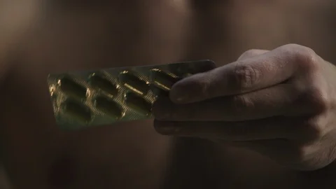 Pills on hand, taking pills Stock-Footage 112124736
