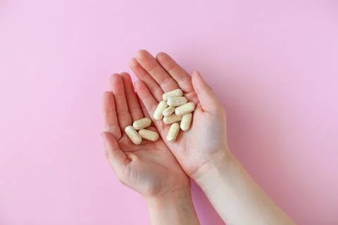 Pills in a hands. Stock Photos