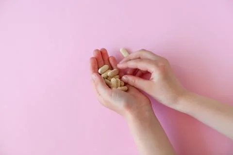 Pills in a hands. Stock Photos