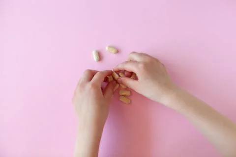Pills in a hands. Stock Photos