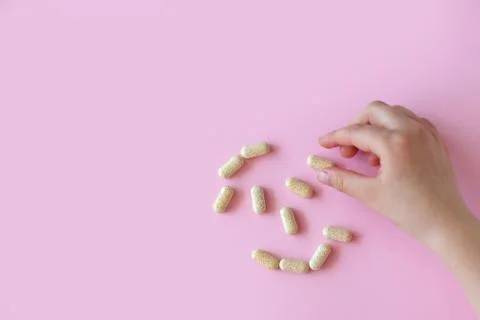 Pills in a hands. Stock Photos