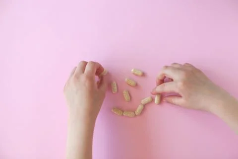 Pills in a hands. Stock Photos