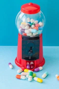 Pills with happy faces Stock Photos