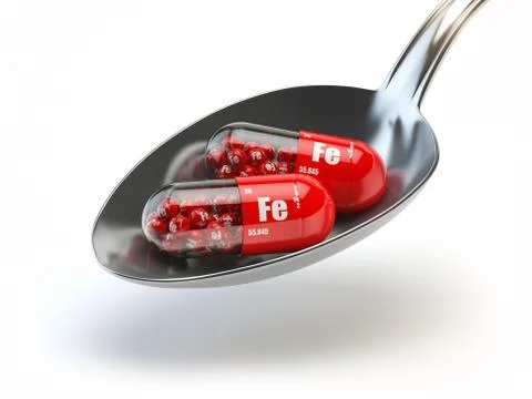 Pills with iron FE ferrum element in spoon. Dietary supplements. Vitamin ca.. Иллюстрация