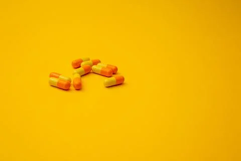 Pills lie on the background Stock Photos