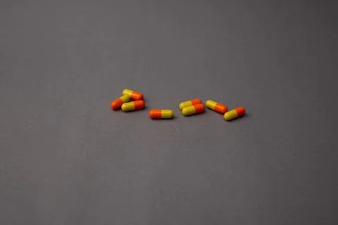 Pills lie on the background Stock Photos