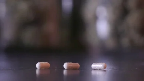 Pills to Marijuana Filled Jars (Rack Focus) 스톡 동영상 82992541
