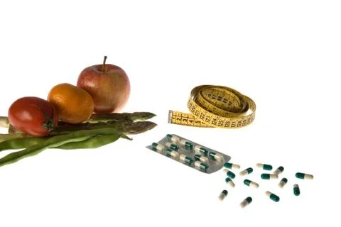 Pills or diet? Stock Photos