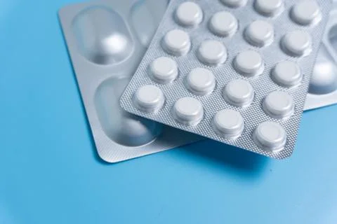 Pills in pack Stock Photos