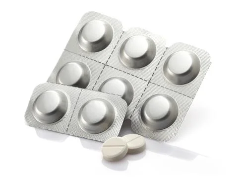 Pills packed in silver blisters Foto stock