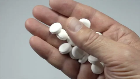 Pills in the palm of the hand Stock Footage 141545464