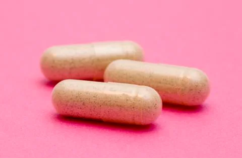Pills on a Pink Background Foto stock
