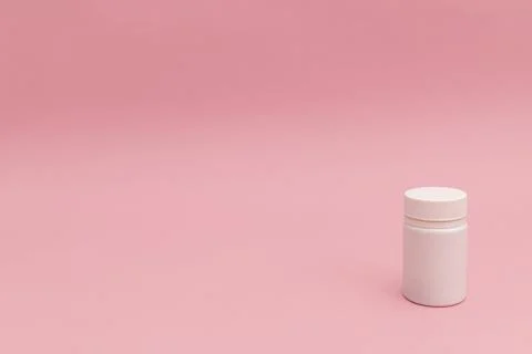 Pills on pink background Stock Photos