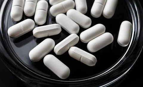 Pills on a plate Stock Photos